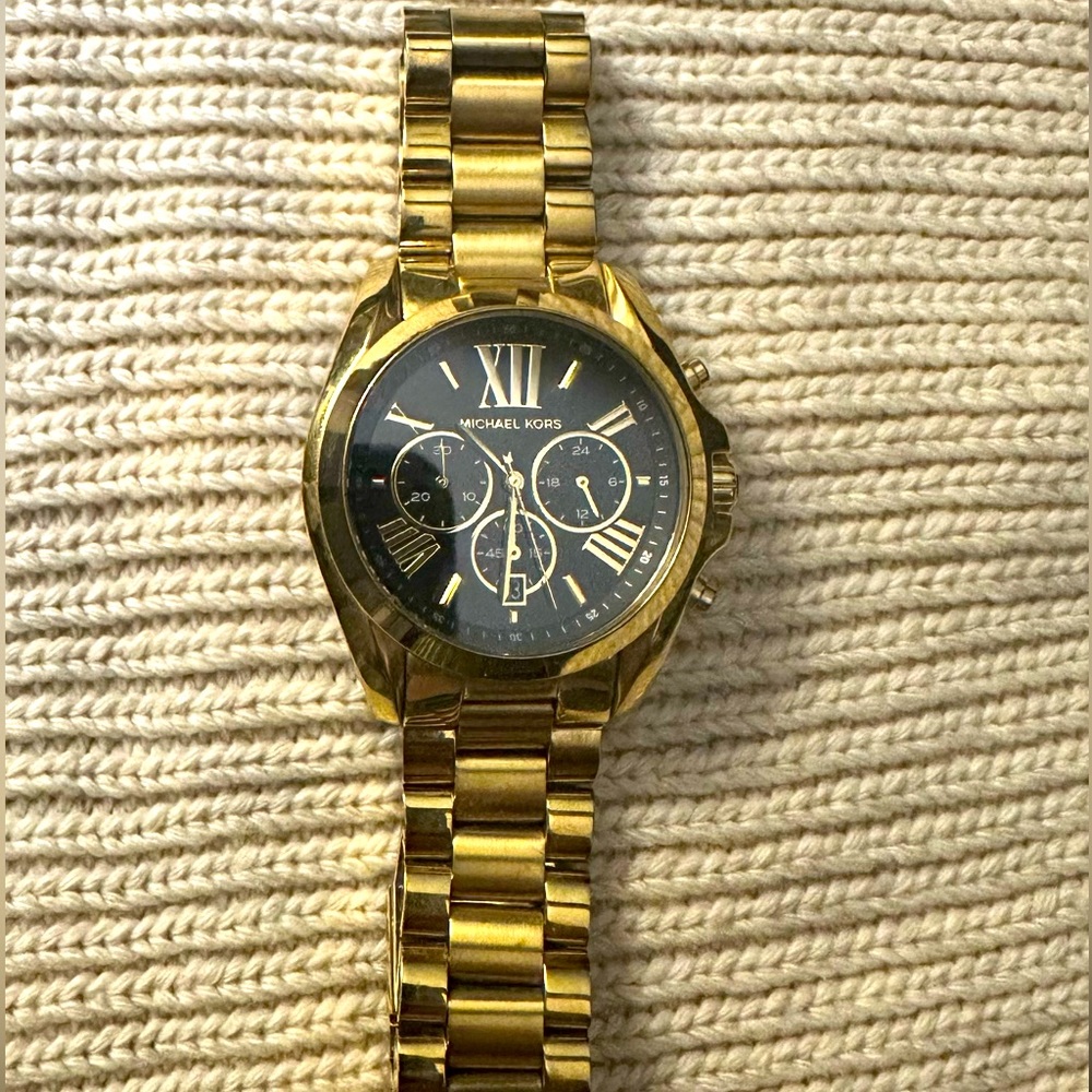 MK gold tone women’s watch